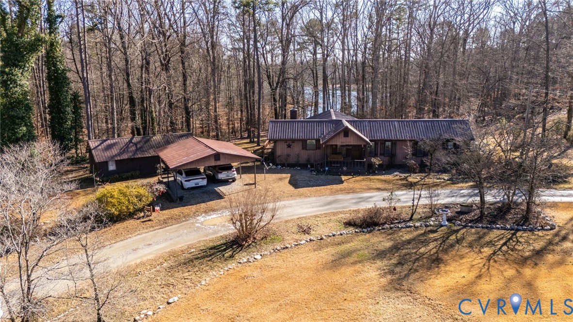 475 Dove Road Boydton, VA 23917 - Photo 42 of 45 a view of a house with a yard covered in snow