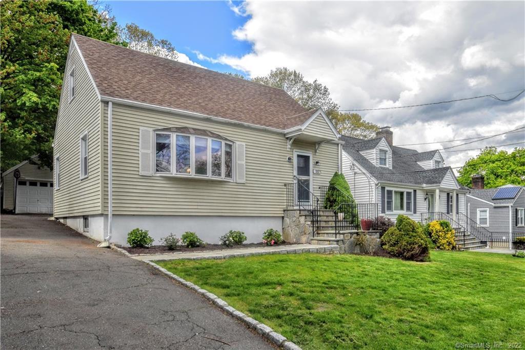 25 Applebee Road Stamford, CT 06905 - Photo 1 of 1 a front view of a house with a garden