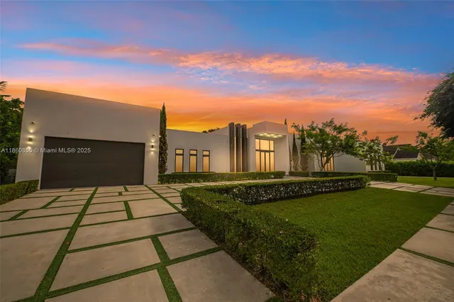 a view of a backyard with garden