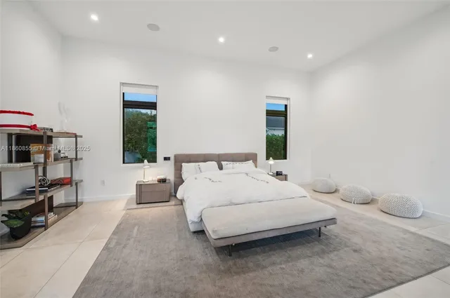 a bathroom with a toilet sink and shower