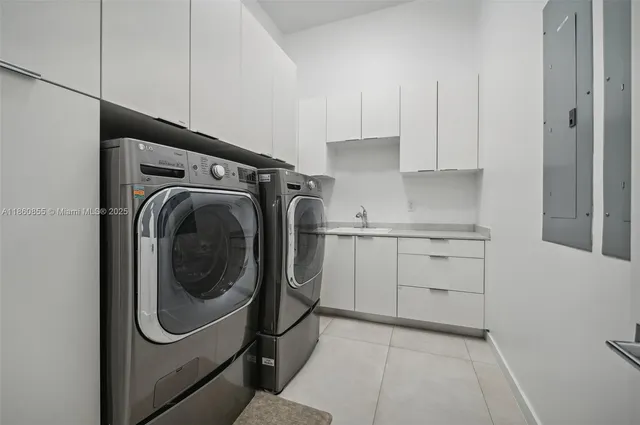 a lobby with furniture and potted plant