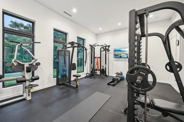 a view of a living room and kitchen