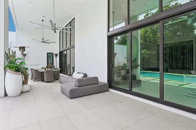 a view of a living room and kitchen