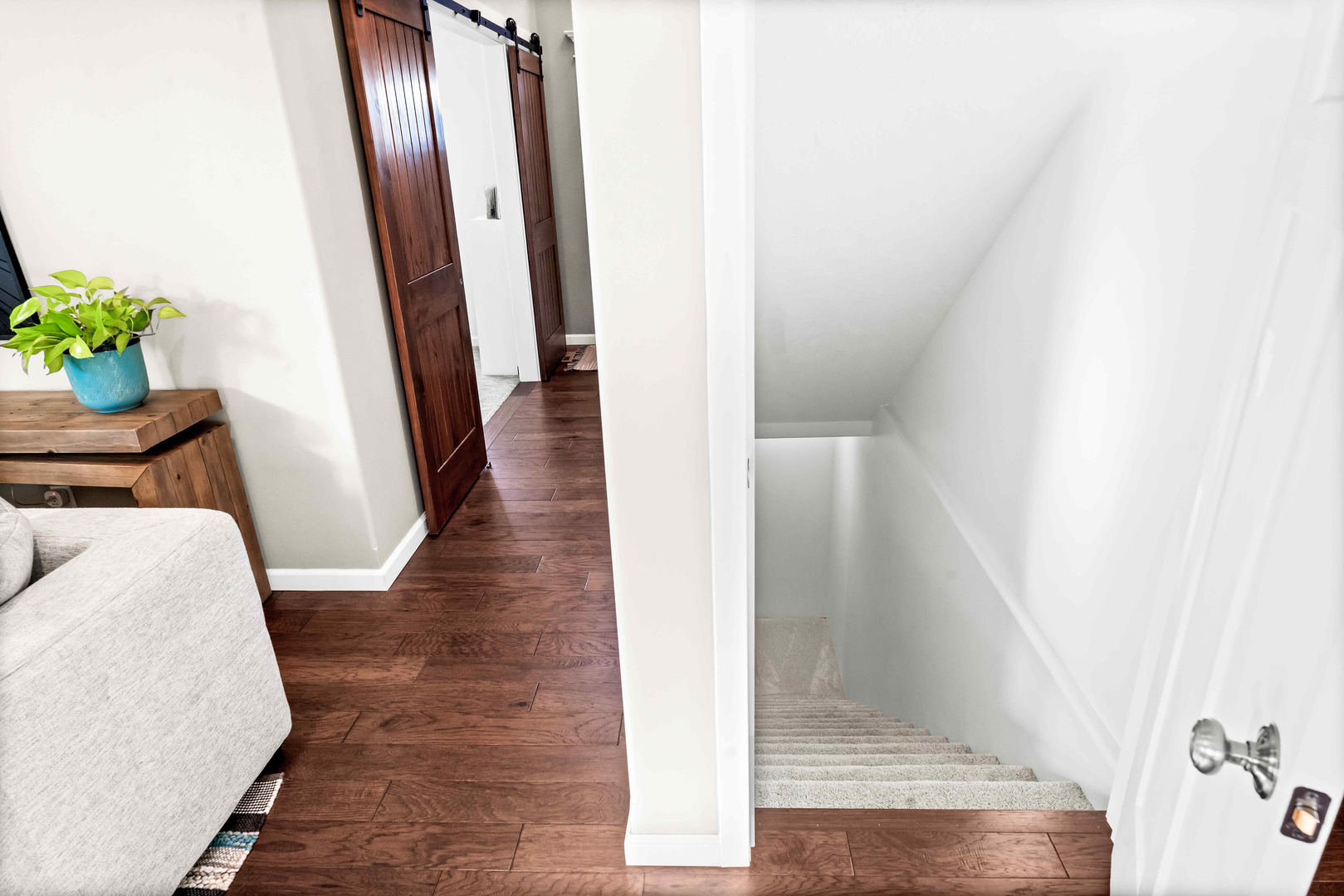 3615 Silverado Trail Normal, IL 61761 - Photo 29 of 37 a view of a hallway with wooden floor and staircase