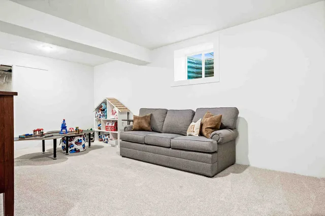 a view of a workspace with furniture