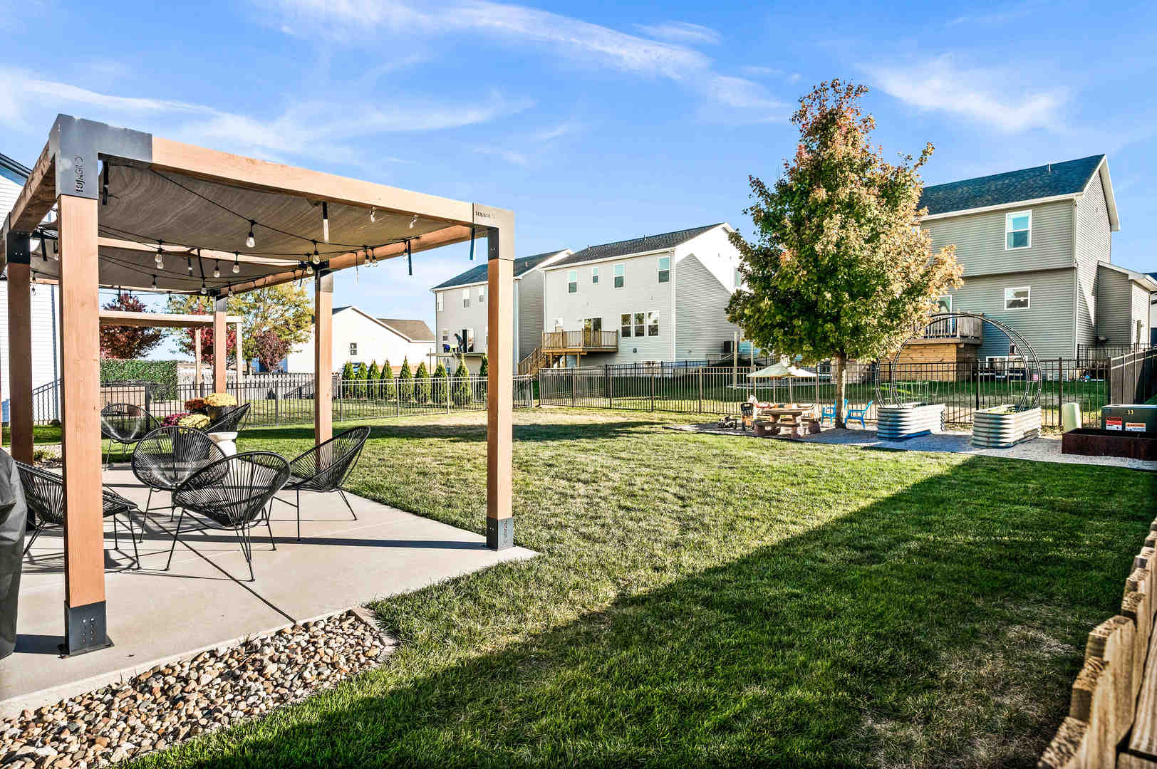 3615 Silverado Trail Normal, IL 61761 - Photo 36 of 37 a view of a patio with table and chairs potted plants with floor to ceiling window
