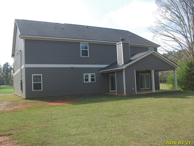 1325 Hawkins Road Woodland, GA 31836 - Photo 2 of 22 a house with yard in front of it