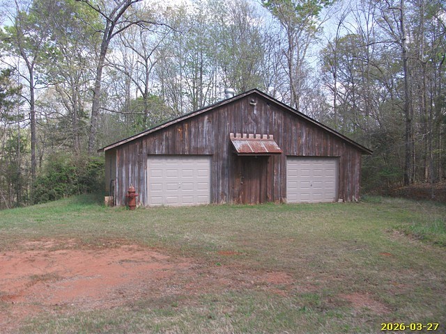 1325 Hawkins Road Woodland, GA 31836 - Photo 5 of 22 a backyard of a house with lots of green space