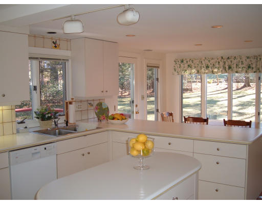 7 Radcliffe Road Wellesley, MA 02482 - Photo 8 of 11 a kitchen with a sink and a window