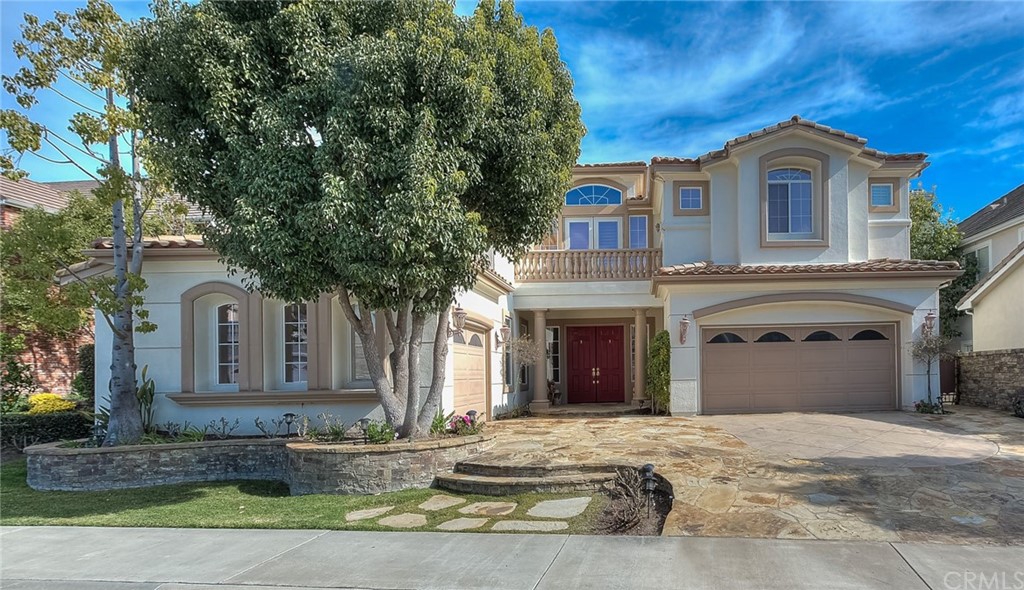16 Bent Oak Coto de Caza, CA 92679 - Photo 11 of 56 a front view of a house with a yard