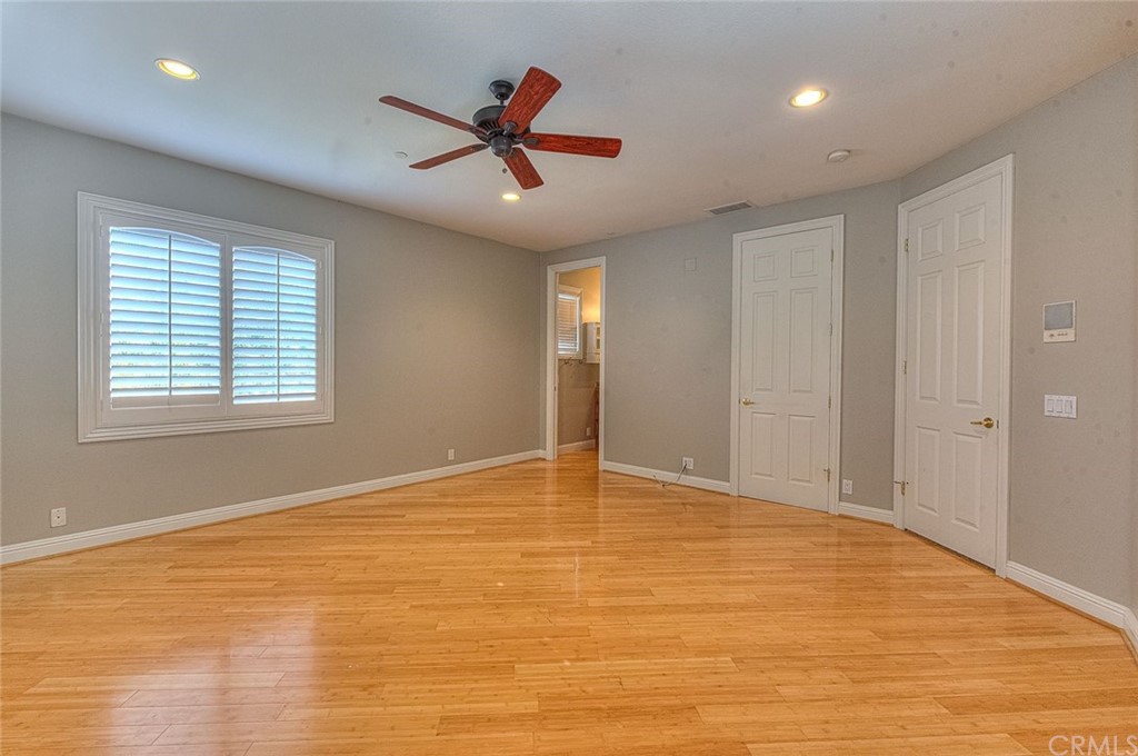 16 Bent Oak Coto de Caza, CA 92679 - Photo 18 of 56 a view of an empty room with wooden floor and a window