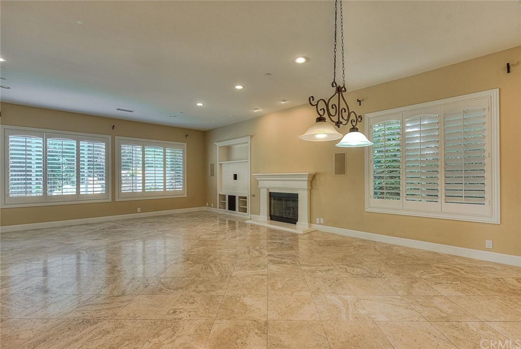 16 Bent Oak Coto de Caza, CA 92679 - Photo 26 of 56 a view of an empty room with window and fireplace
