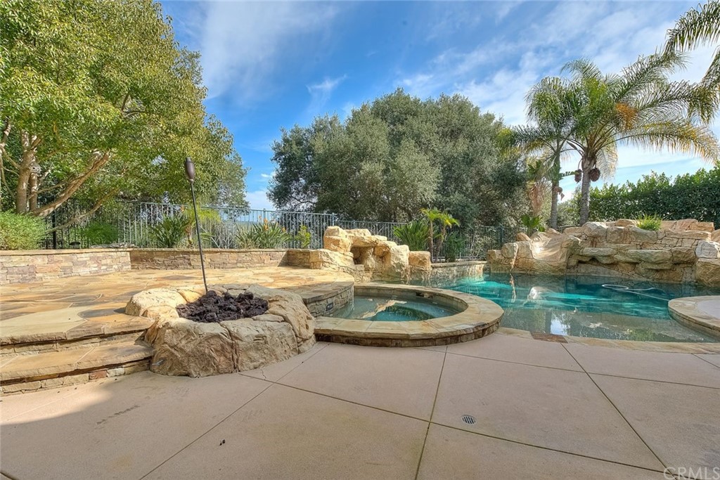 16 Bent Oak Coto de Caza, CA 92679 - Photo 3 of 56 a backyard of a house with fountain table and chairs