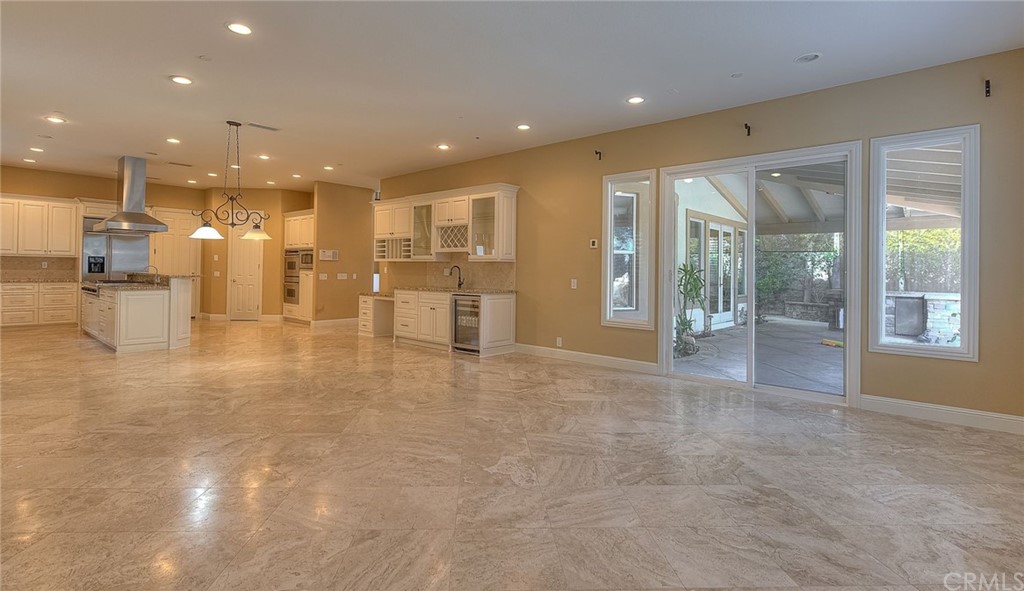 16 Bent Oak Coto de Caza, CA 92679 - Photo 31 of 56 a view of a large kitchen with lots of counter space and windows