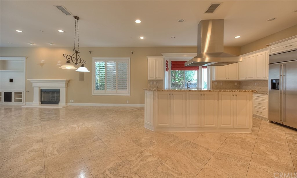 16 Bent Oak Coto de Caza, CA 92679 - Photo 39 of 56 a view of a kitchen with a sink and a kitchen counter top