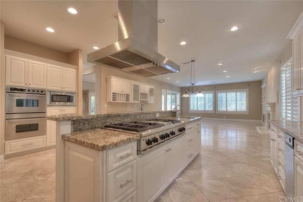 16 Bent Oak Coto de Caza, CA 92679 - Photo 42 of 56 a kitchen that has a stove and a sink