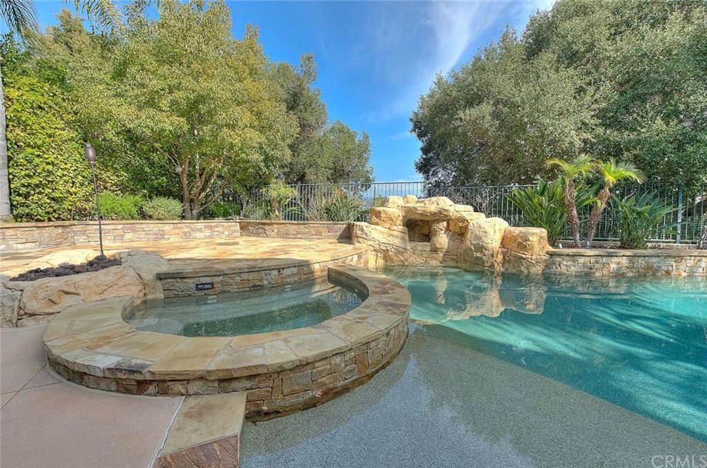 16 Bent Oak Coto de Caza, CA 92679 - Photo 5 of 56 a view of a swimming pool with a sitting space
