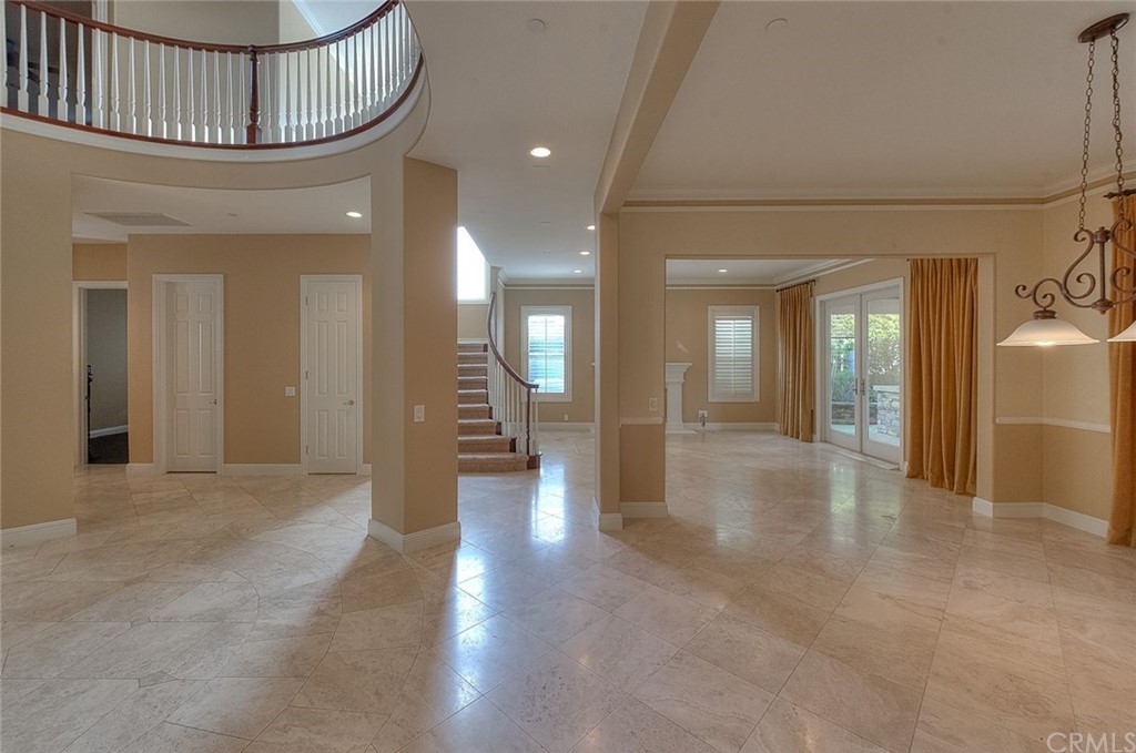 16 Bent Oak Coto de Caza, CA 92679 - Photo 56 of 56 a view of a hallway with wooden floor and staircase
