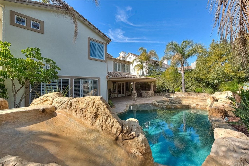 16 Bent Oak Coto de Caza, CA 92679 - Photo 10 of 56 a view of a house with backyard porch and sitting area