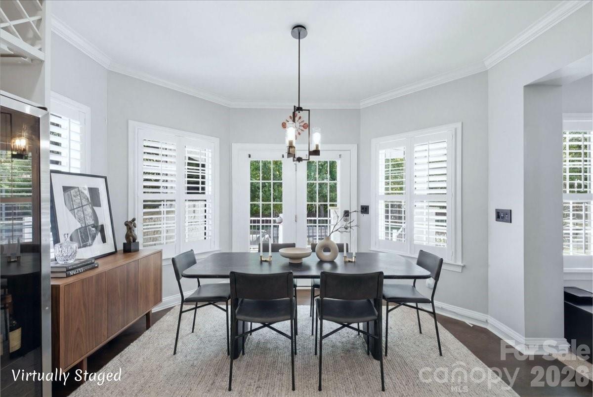 1825 Laveta Road Charlotte, NC 28269 - Photo 17 of 48 a view of a dining room with furniture window and outside view