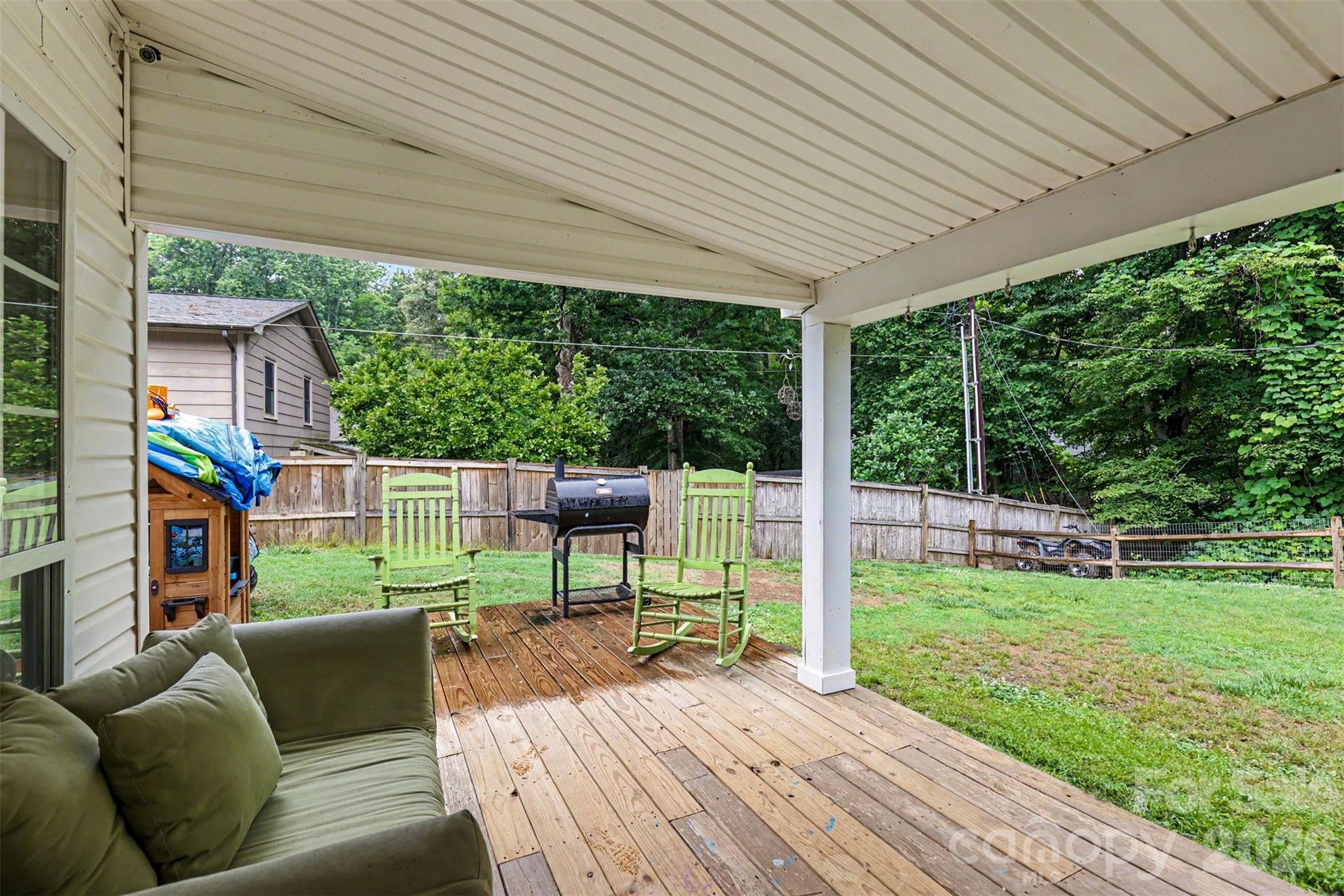 184 Canal Road Belmont, NC 28012 - Photo 9 of 39 a balcony with furniture and garden