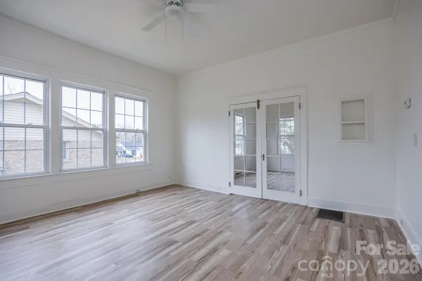 a view of a kitchen from a room