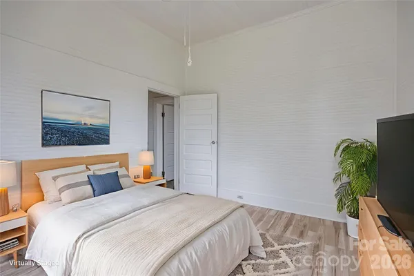 a view of room with window and ceiling fan