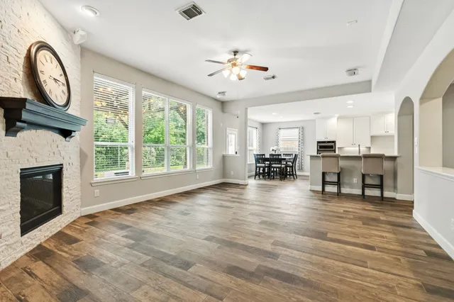 a view of kitchen with furniture and a large window