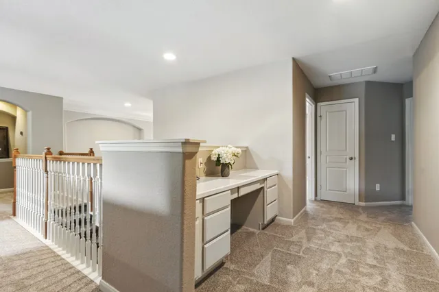 a kitchen with a refrigerator sink and stove