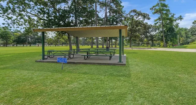 a view of a park with swings