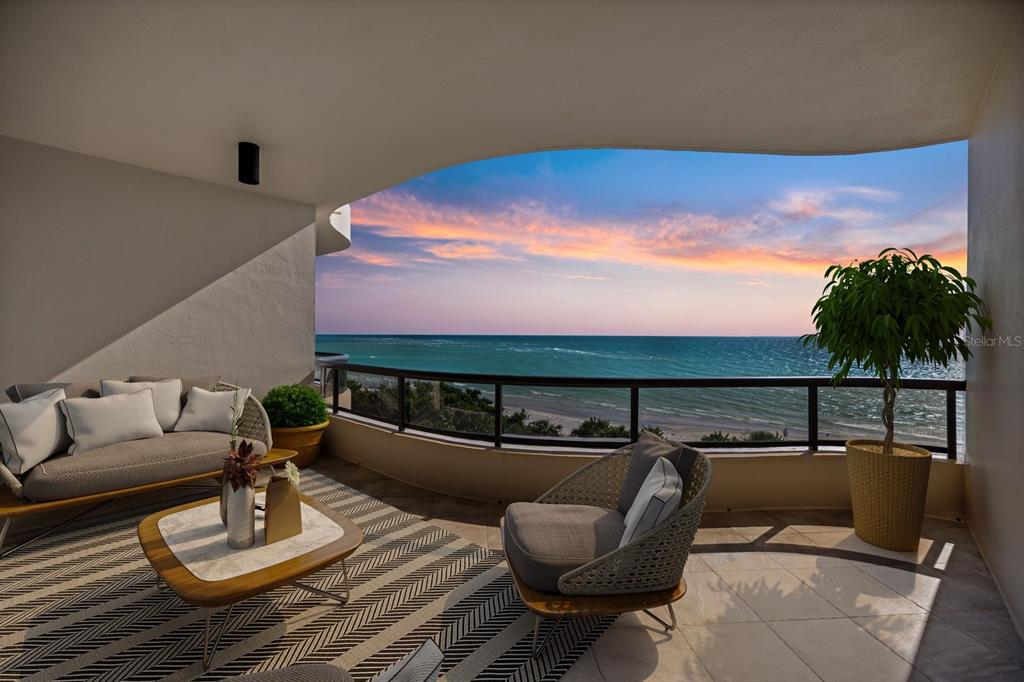 415 L L Ambiance Drive, Unit C403 Longboat Key, FL 34228 - Photo 1 of 81 a balcony with furniture and city view
