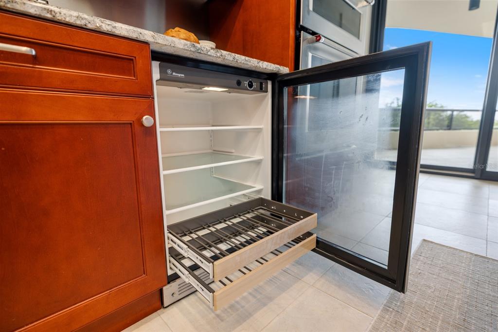 415 L L Ambiance Drive, Unit C403 Longboat Key, FL 34228 - Photo 44 of 81 a view of kitchen with a stove and a refrigerator