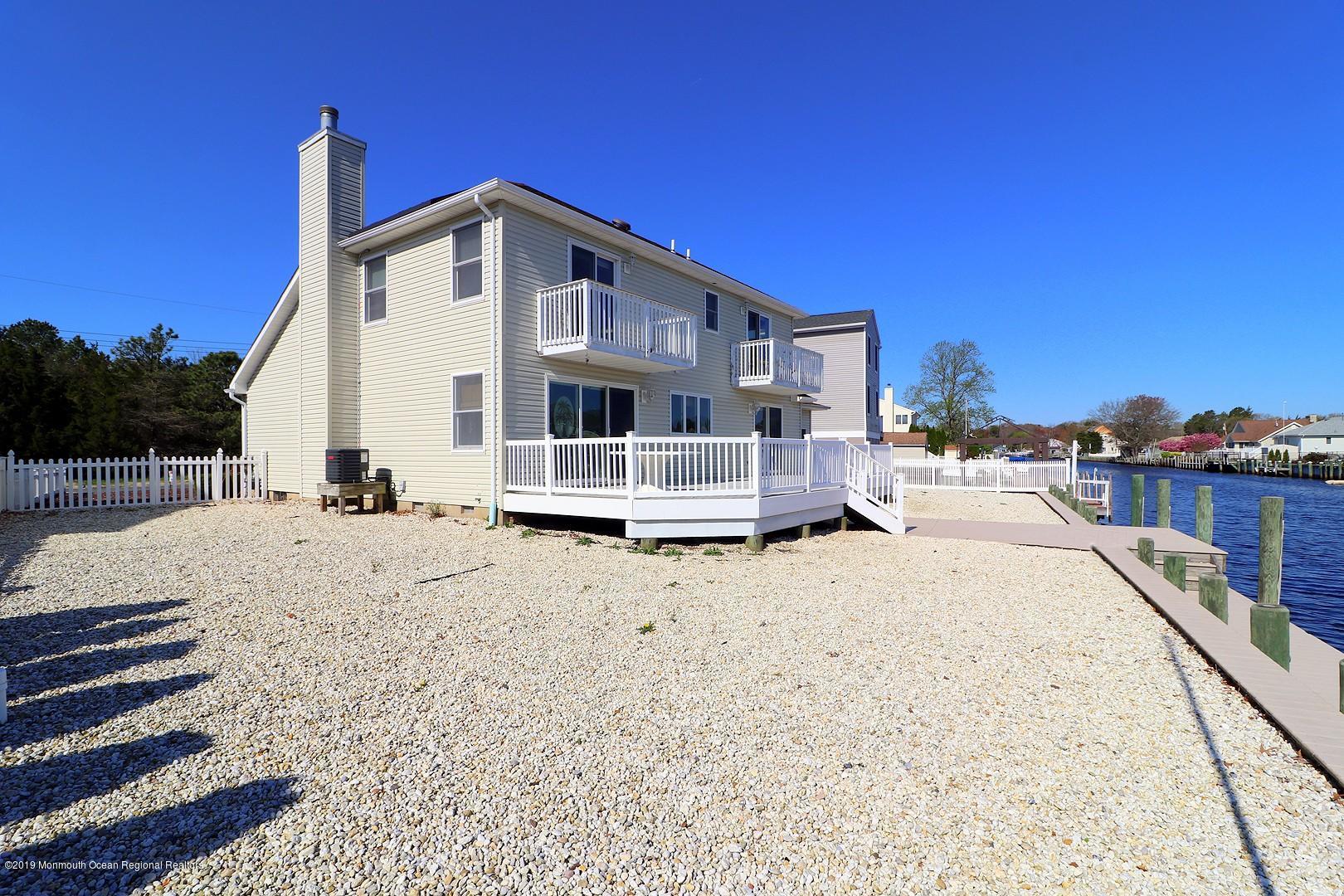 130 Cedar Run Road Bayville, NJ 08721 - Photo 5 of 57 a view of a house with a yard