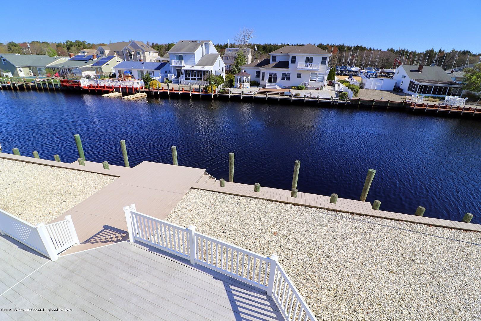 130 Cedar Run Road Bayville, NJ 08721 - Photo 54 of 57 a view of a terrace with sitting area