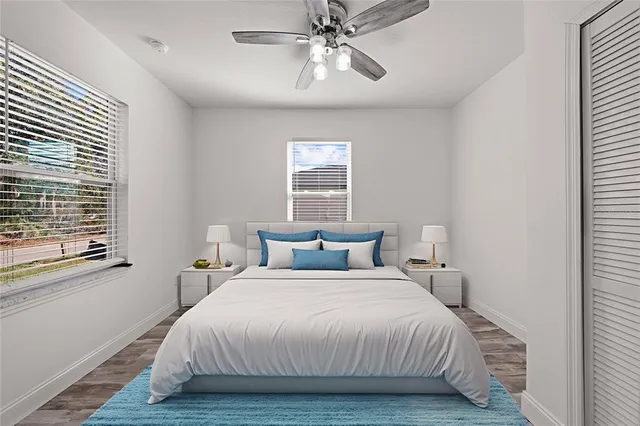 a bedroom with a bed and window