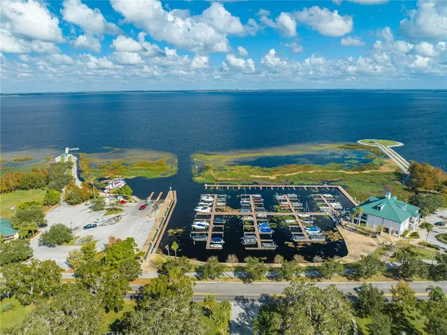 a view of a swimming pool with an outdoor space and seating area
