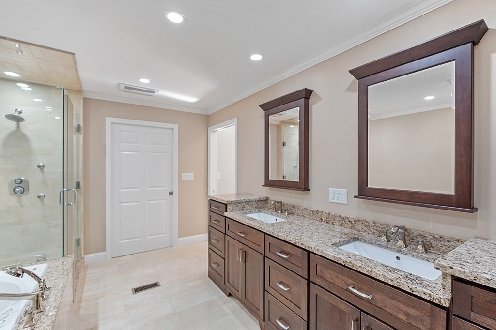 83 Weldon Farm Road Rowley, MA 01969 - Photo 20 of 41 a bathroom with a granite countertop sink mirror and double