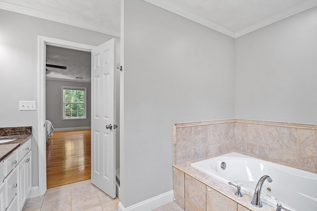 83 Weldon Farm Road Rowley, MA 01969 - Photo 29 of 41 a bathroom with a tub and sink