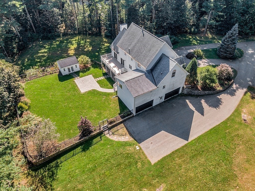 83 Weldon Farm Road Rowley, MA 01969 - Photo 36 of 41 an aerial view of a house having yard