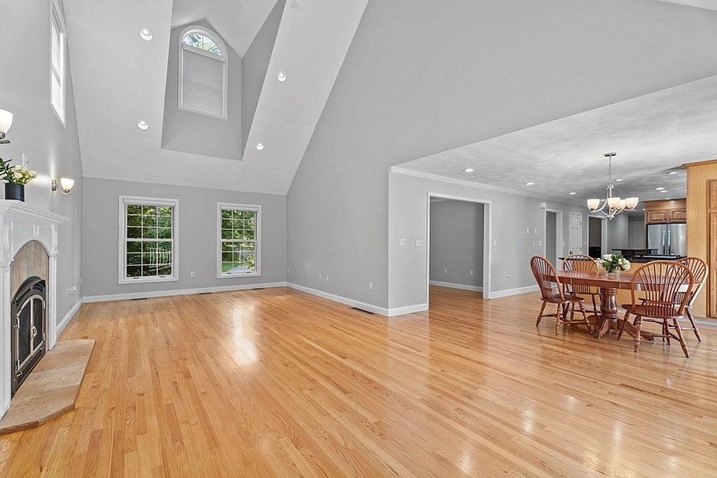 83 Weldon Farm Road Rowley, MA 01969 - Photo 4 of 41 a view of a dining room with furniture window and wooden floor