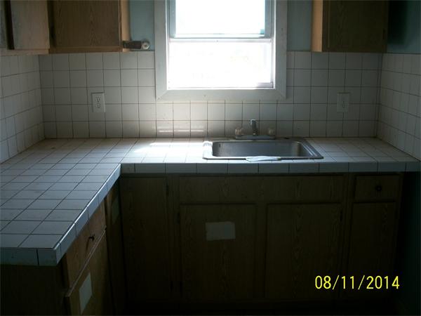 527 Division Street Fall River, MA 02721 - Photo 13 of 30 a bathroom with a sink and a bathtub