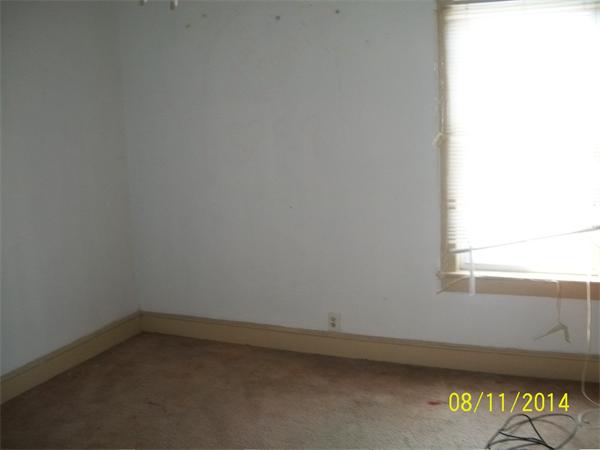 527 Division Street Fall River, MA 02721 - Photo 14 of 30 a room that has a window