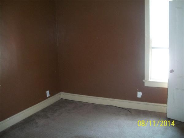527 Division Street Fall River, MA 02721 - Photo 15 of 30 a room that has a window