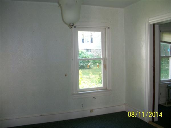 527 Division Street Fall River, MA 02721 - Photo 21 of 30 an empty room with a window