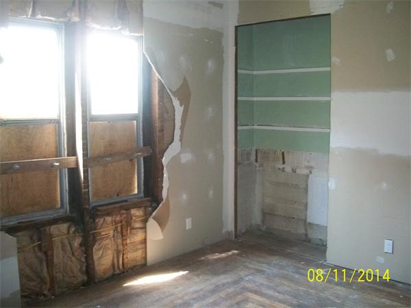 527 Division Street Fall River, MA 02721 - Photo 24 of 30 a view of empty room with wooden floor and fan