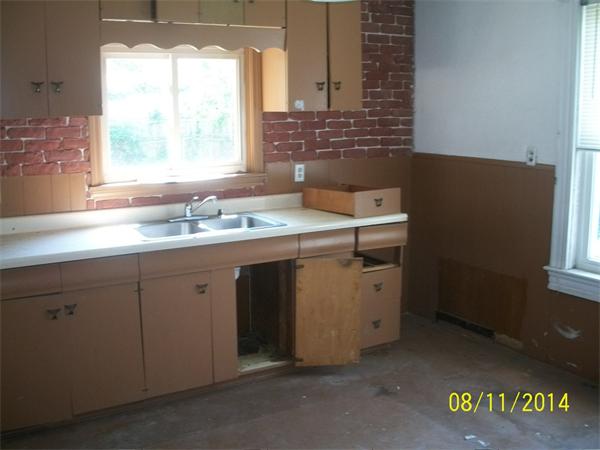 527 Division Street Fall River, MA 02721 - Photo 25 of 30 a utility room with sink dryer and washer