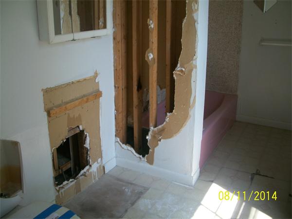 527 Division Street Fall River, MA 02721 - Photo 28 of 30 a view of a hallway with wooden floor and stairs