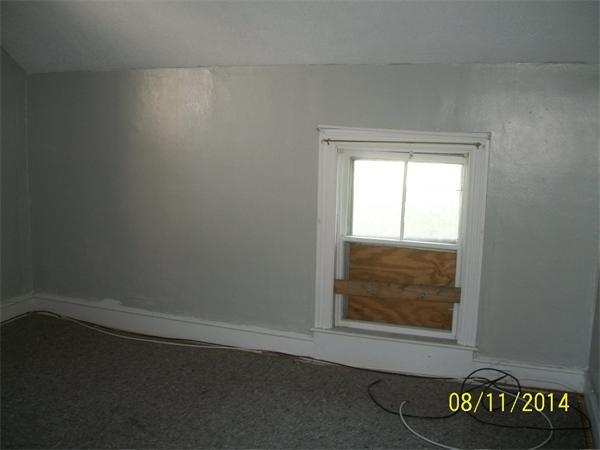 527 Division Street Fall River, MA 02721 - Photo 30 of 30 an empty room with a window