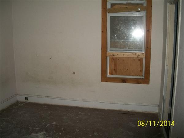 527 Division Street Fall River, MA 02721 - Photo 8 of 30 an empty room with a bench