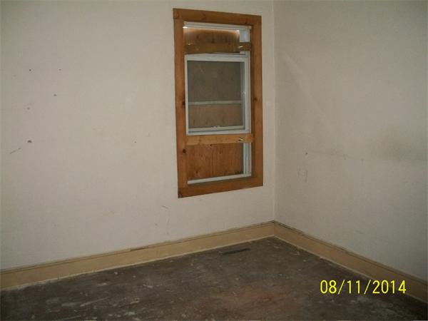 527 Division Street Fall River, MA 02721 - Photo 9 of 30 an empty room with a window